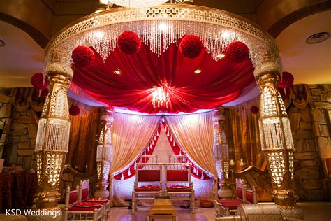 A regal Indian wedding and reception with all the floral fixin
