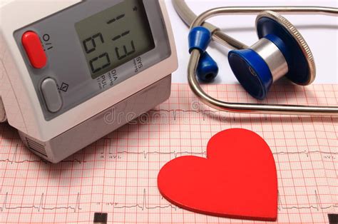 Stethoscope Heart Shape Blood Pressure Monitor On Electrocardiogram
