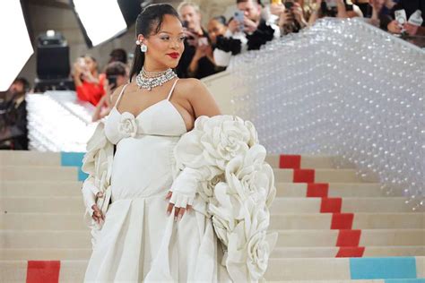 A Look At Rihannas Fashionably Late Met Gala Appearances Approved By