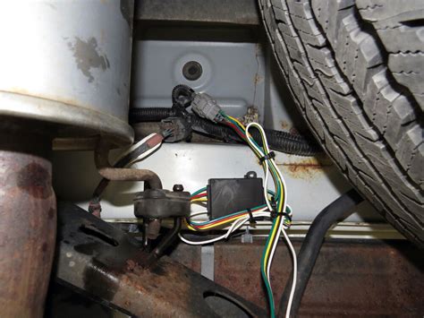 To divert electrical flow to the trailer wiring harness from your tail light wiring, you'll need to tap into the wire. T-One Vehicle Wiring Harness with 4-Pole Flat Trailer Connector Tekonsha Custom Fit Vehicle ...