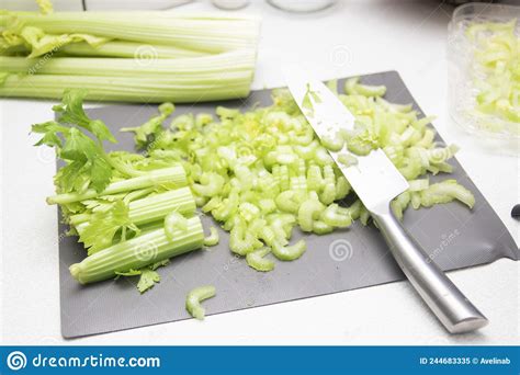 Fresh Sliced Celery Cut Celery Sticks And Leaves On Wooden Table