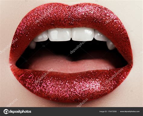 Glamour Fashion Bright Red Lips Make Up With Glitter Macro Of Womans