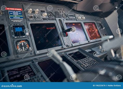 Aircraft Flight Deck With Flight Displays Switches And Knobs Stock