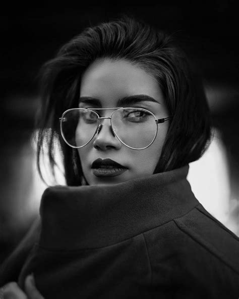 Black And White Grayscale Photo Of Woman Wearing Coat And Eyeglasses