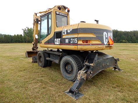 The cat®315 excavator offers superior performance in a compact design. used 2003 CAT M315 Wheel Excavator for sale