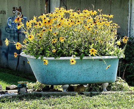 Before we talk about what bathtubs have become today, let's start by 1 modern garden tub. Using An Old Bathtub As A Container In Your Garden - A ...