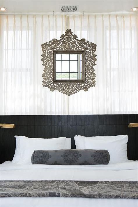 White And Black Moroccan Style Bedroom Features Walls Draped In White