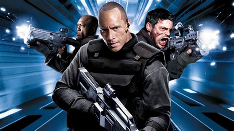 Something is wrong with the research base on mars, so a team lead by the rock is sent in to investigate to find out that there are a bunch of crazy killing monsters. Doom (2005) | FilmFed - Movies, Ratings, Reviews, and Trailers
