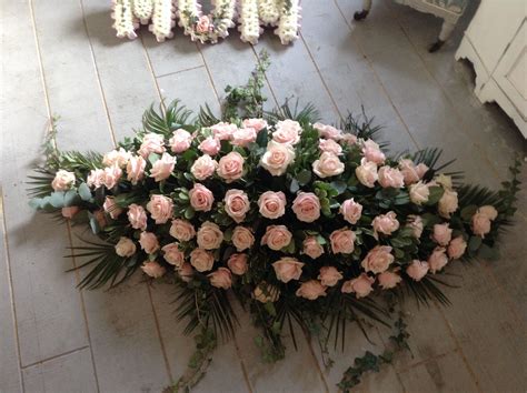 (we are the preferred florist for the tabor funeral home in brighton, co). Vintage pink roses, funeral spray, casket spray, coffin ...
