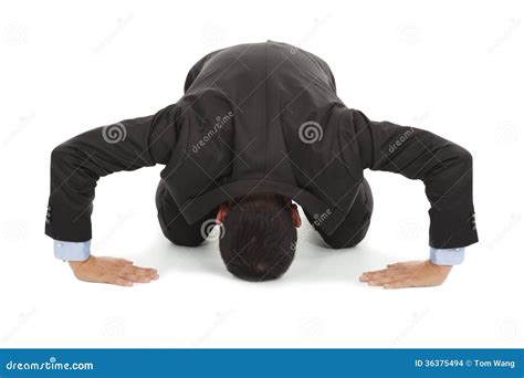 Businessman Apologize With Japanese Kneeling Position Stock Photo