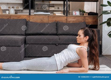 Beautiful Young Woman Practicing Yoga At Home In Stock Image Image Of Wellbeing Girl 155863351