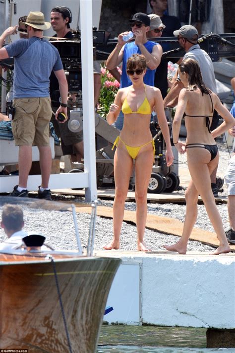 Dakota Johnson Wears Very Skimpy Yellow Bikini