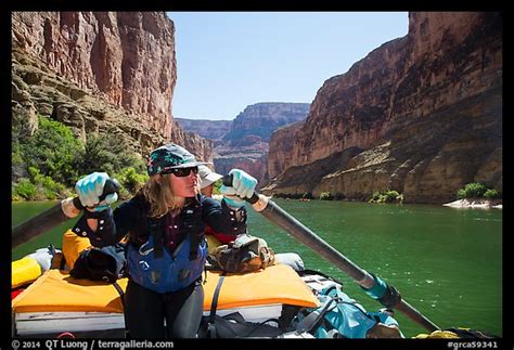 picture photo woman rows raft on calm section of colorado river marble canyon grand canyon