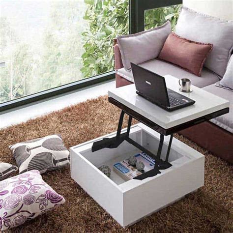 This large cocktail table includes one lower drawer with silvertone metal pulls and a large open shelf for displaying. 11 Stylish Space Saving Coffee Tables - vurni