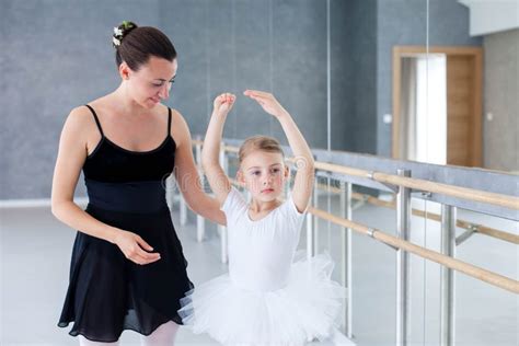 Little Ballerina And Ballet Teacher Have Practice In Classical Dancing School Dance Trainer Is