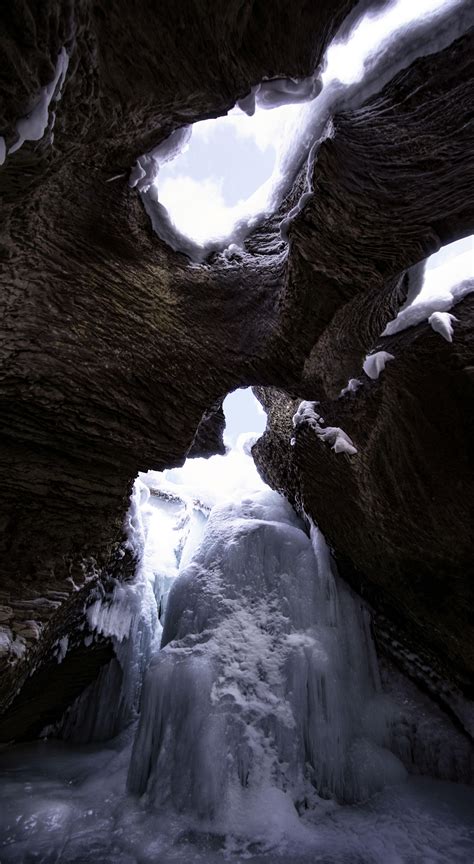 Frozen Waterfall Inside A Cave At Natural Bridge In Field Bc Canada Oc