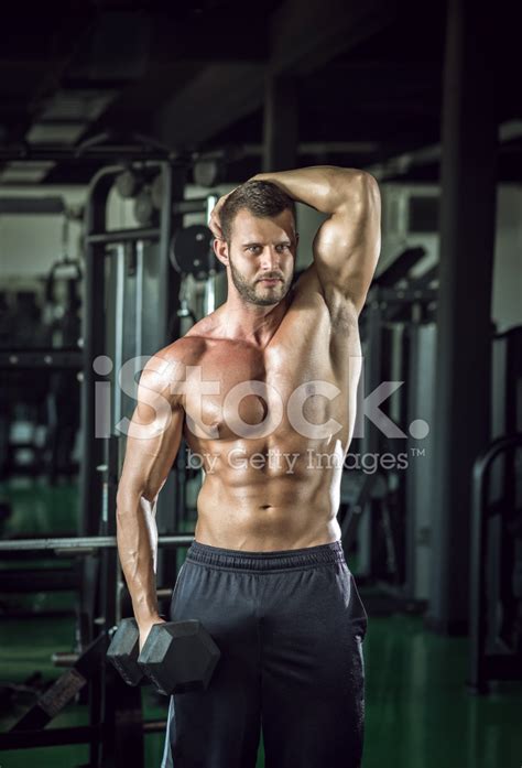 Man Doing Bicep Curls Stock Photo Royalty Free Freeimages