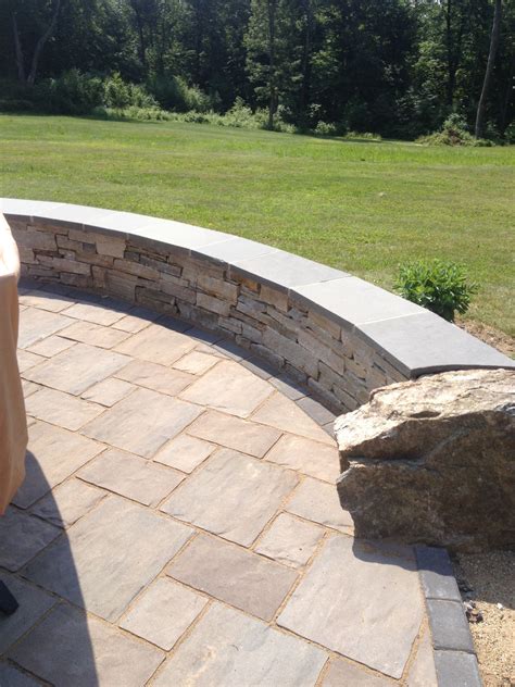 Natural Stone Sitting Wall With Bluestone Cap By Bahler Brothers