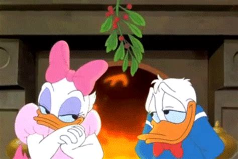 will you be kissed under the mistletoe disney donald and daisy duck christmas cartoons