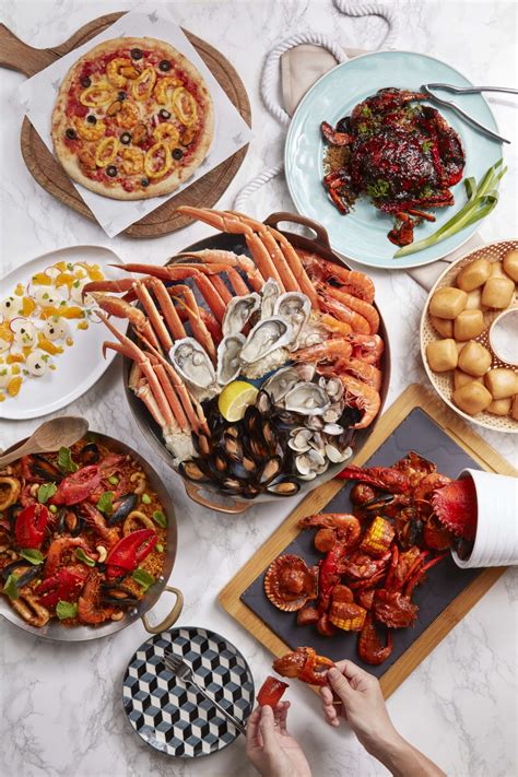 Luxurious And Extravagant Seafood Buffet Spreads With Chefs Shows