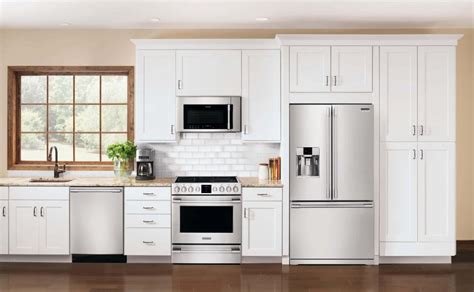 Antique White Kitchen Cabinets With Black Stainless Appliances
