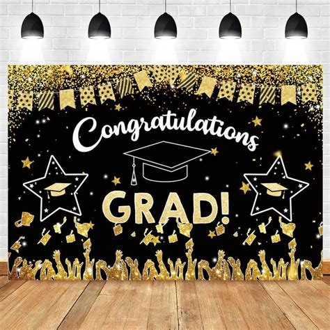 Congratulations Graduates With Gold Glitter And Graduate Silhouettes