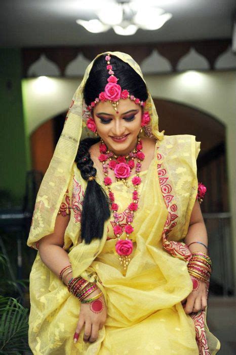 Yellow Saree And Pink Flower Jewelry For Gaye Holud Wedding Flower