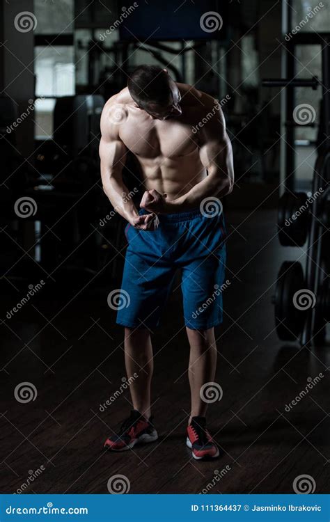 Nerd Man Standing Strong In Gym Stock Image Image Of Human Geek