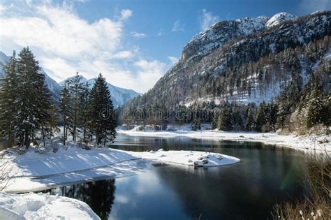 Beautiful View On Lake Lago Del Predil In Scenic Snowy Winter With