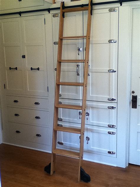 8 Clever Ways To Use A Rolling Library Ladder All Over The House
