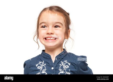 Little Girl Smiling With Funny Expression Stock Photo Alamy