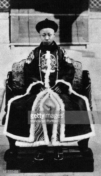 The Last Emperor Of China Pu Yi Sitting On The Throne At The Age Of