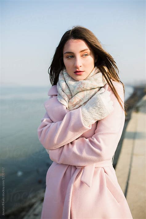 Portrait Of A Beautiful Young Woman Wearing Pink Coat By Jovana Rikalo