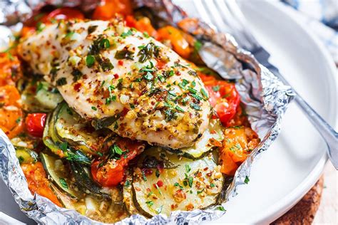 With a sharp knife, carefully cut the chicken breast in half lengthwise. Honey Dijon Chicken and Veggies Foil Packs — Eatwell101