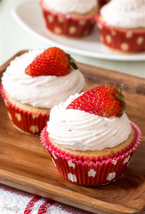 Chocolate chip cupcakes with strawberry whipped cream frosting recipe. Strawberries and Cream Cupcakes | Pretty. Simple. Sweet.