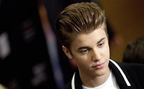 in other news justin bieber reacts to paparazzi death tory burch settles with ex bobby womack