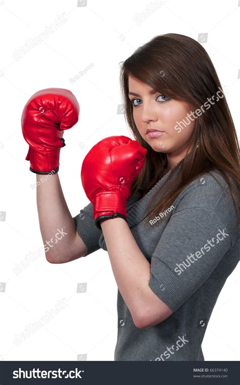 A Beautiful Young Woman Wearing A Pair Of Boxing Gloves Stock Photo