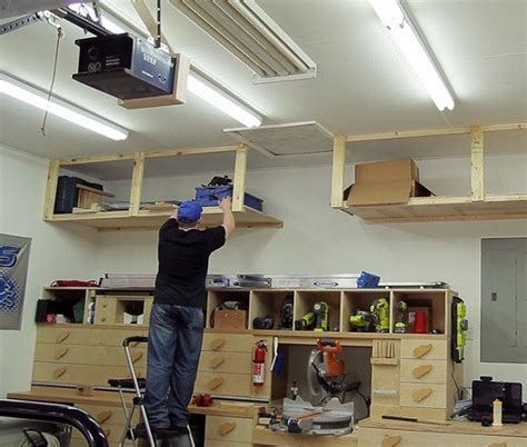 Create a sliding storage system that hangs from the ceiling and saves all of your wall and floor area for other things. 10 DIY Garage Shelves Ideas to Maximize Garage Storage | Home Interiors