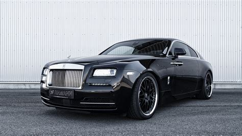 The design leads with the vertical slats of rolls' phantom grille. Rolls-Royce Wraith