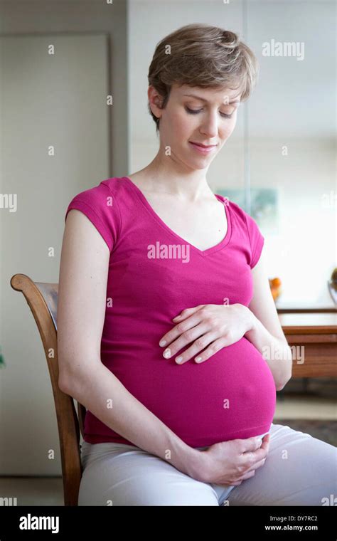 Pregnant Woman Sitting In Chair Hi Res Stock Photography And Images Alamy