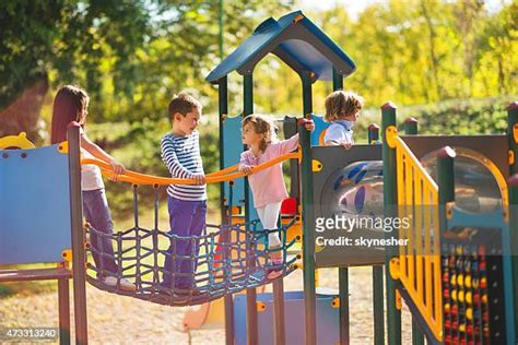 Playing In Park Photos And Premium High Res Pictures Getty Images