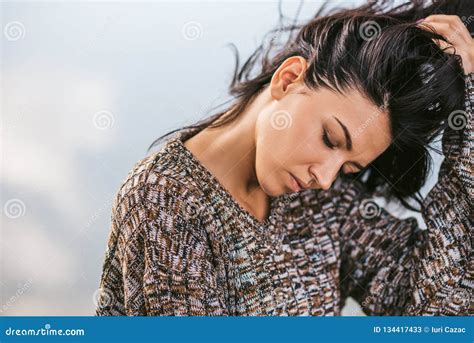 Closeup Portrait Of Beautiful Dreamy Brunette Female With Closed Eyes