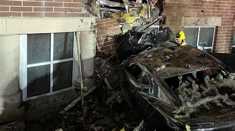 Two Dead One Injured After Car Crashes Into Brick Building