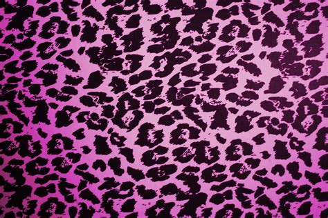 A Pink And Black Leopard Print Background