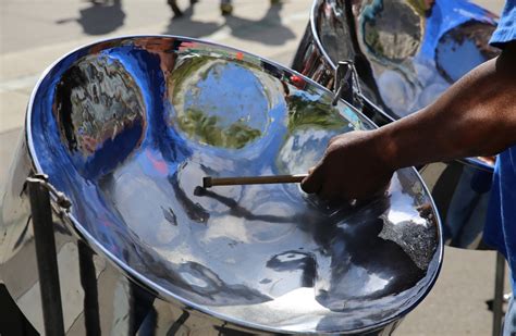 Their tropical, upbeat tunes send out an optimistic call to leave worries aside and enjoy the you can easily learn to play jamaican steel drums even if you have little or no experience in playing musical instruments. Our Emblems | Life In Trinidad & Tobago