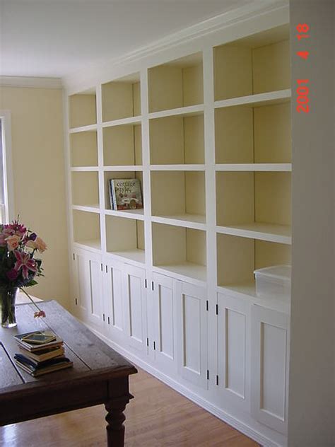 Floor to ceiling cupboards more. Floor to ceiling built ins, with bookshelves and cabinets ...