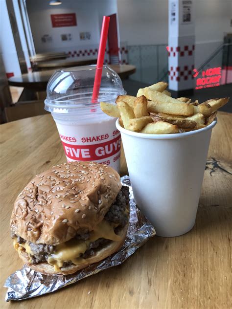 Five Guys bacon cheeseburger, fries and strawberry milkshake