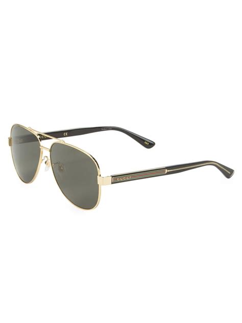 gucci men s signature web metal aviator sunglasses in gold metallic for men lyst
