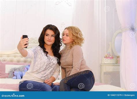 Two Beautiful Girls Make Selfie Photo Using Gadget For Memory Stock Image Image Of Friends