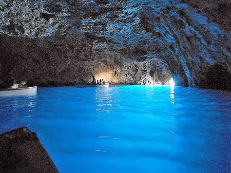 The Blue Grotto In Capri Is A Cave Lit Up By Its Mostly Underwater